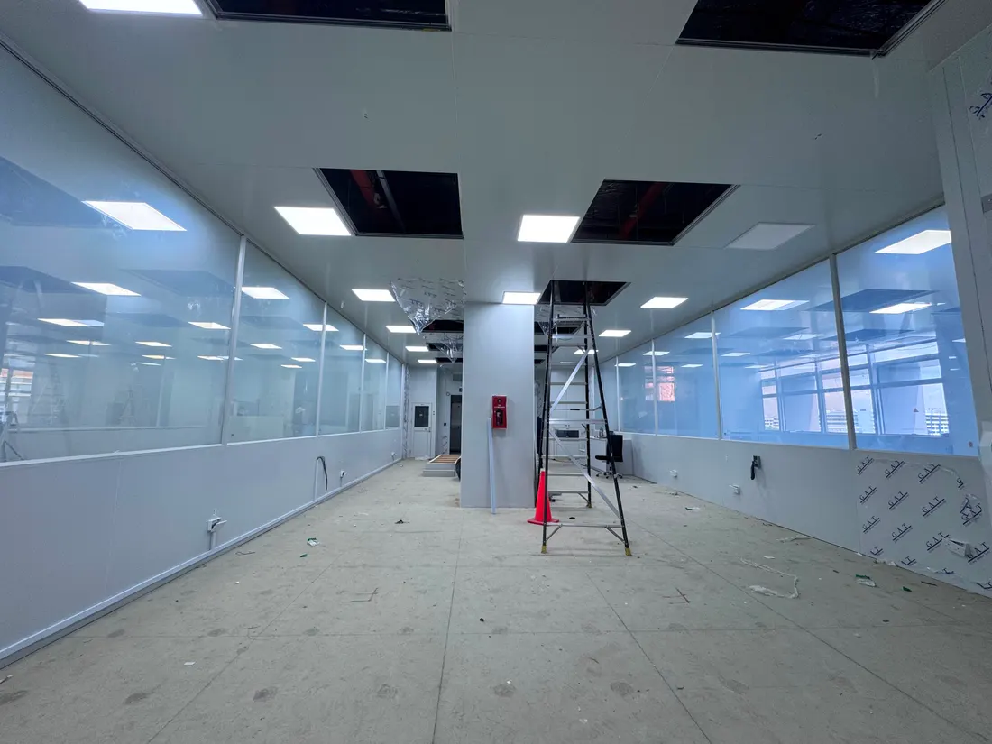 A commercial glass partition run in Singapore fitted with Smart Film