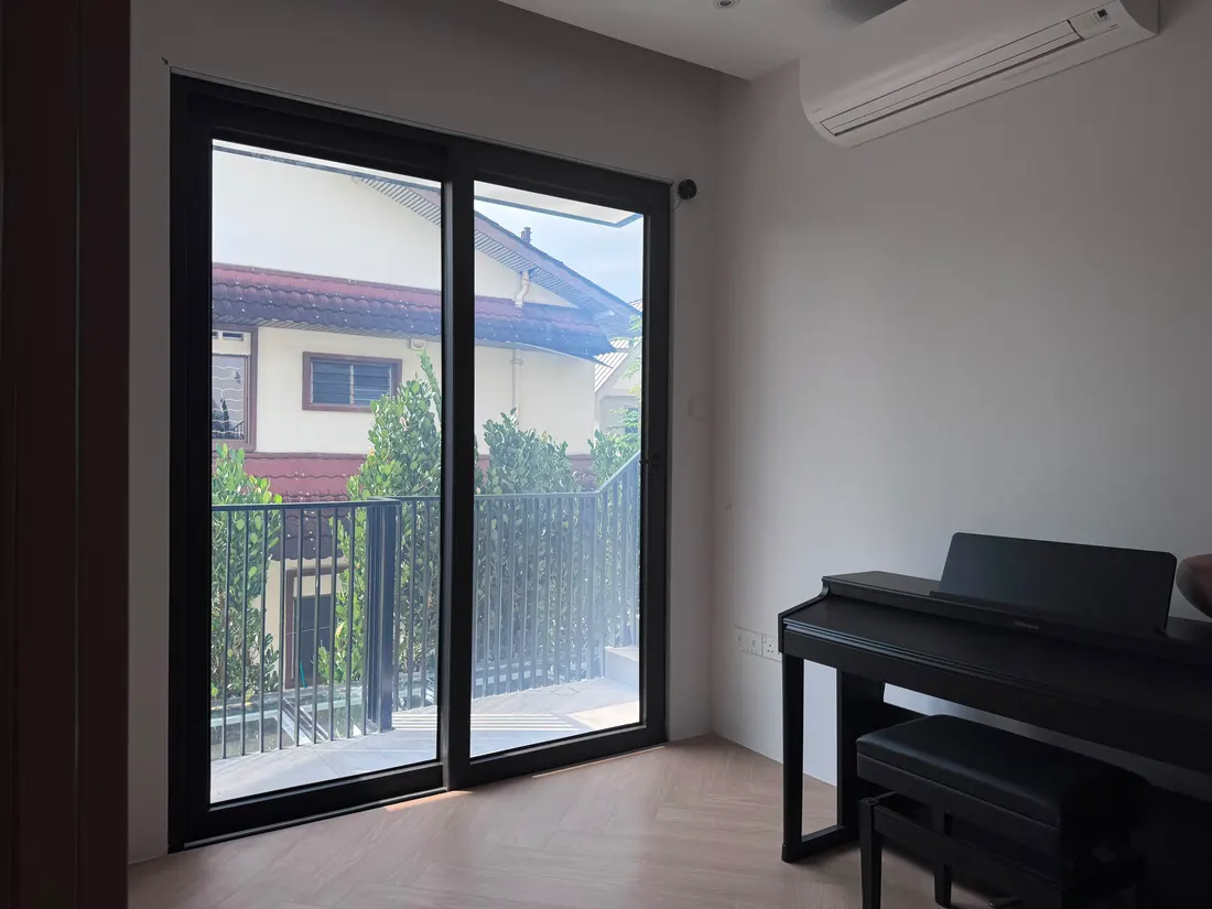 A residential sliding glass door with Smart Film switched clear