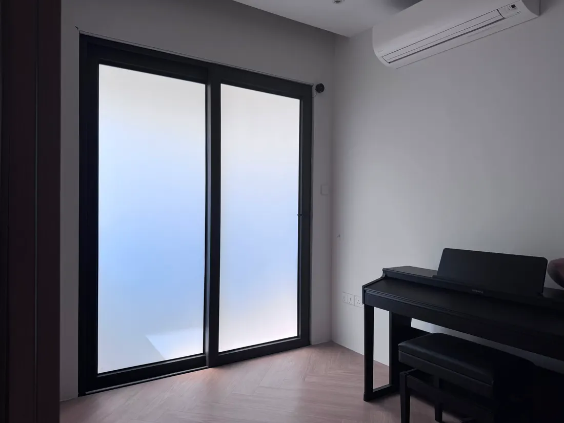 The same sliding glass door with Smart Film switched frosted