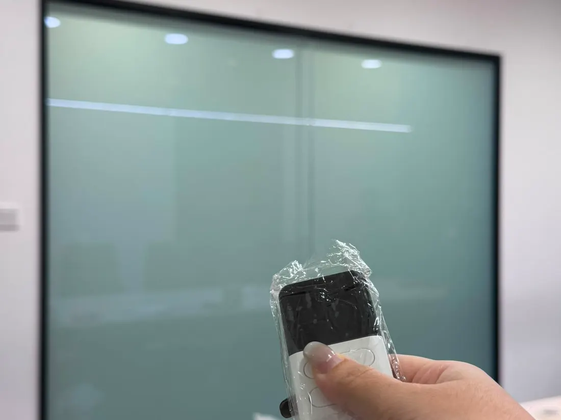 The same office meeting room partition with Smart Film switched frosted