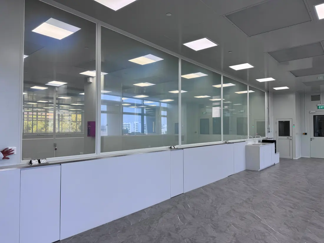 Laboratory corridor at ITE College with 22 Smart Glass panels switched clear, daylight coming through