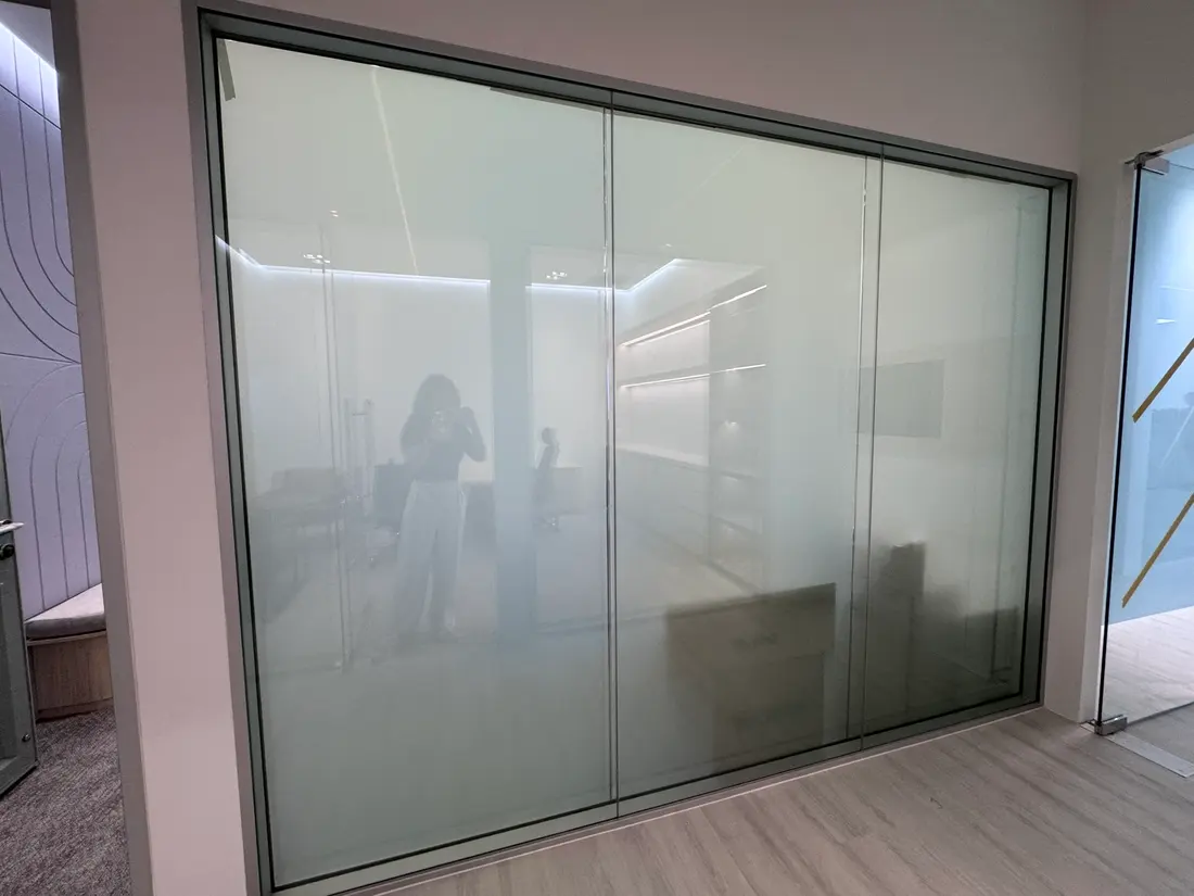 The same Quasar meeting room partition switched frosted for a private meeting