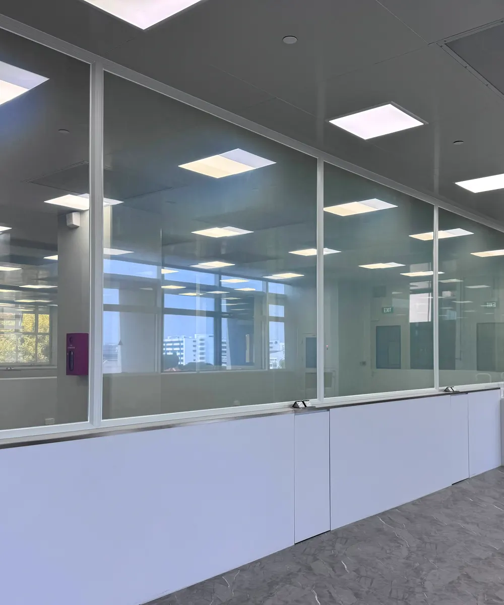 Completed glass partition run along a laboratory at ITE College in Singapore