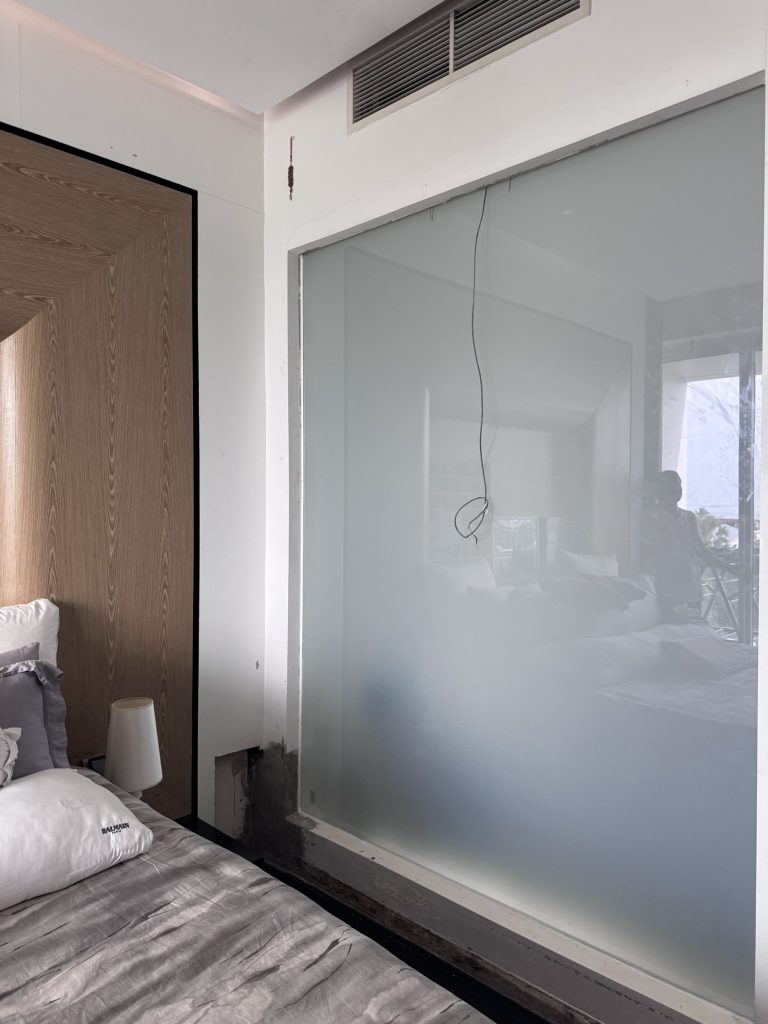 Smart film on bathroom glass, a wet-area installation that needs extra planning